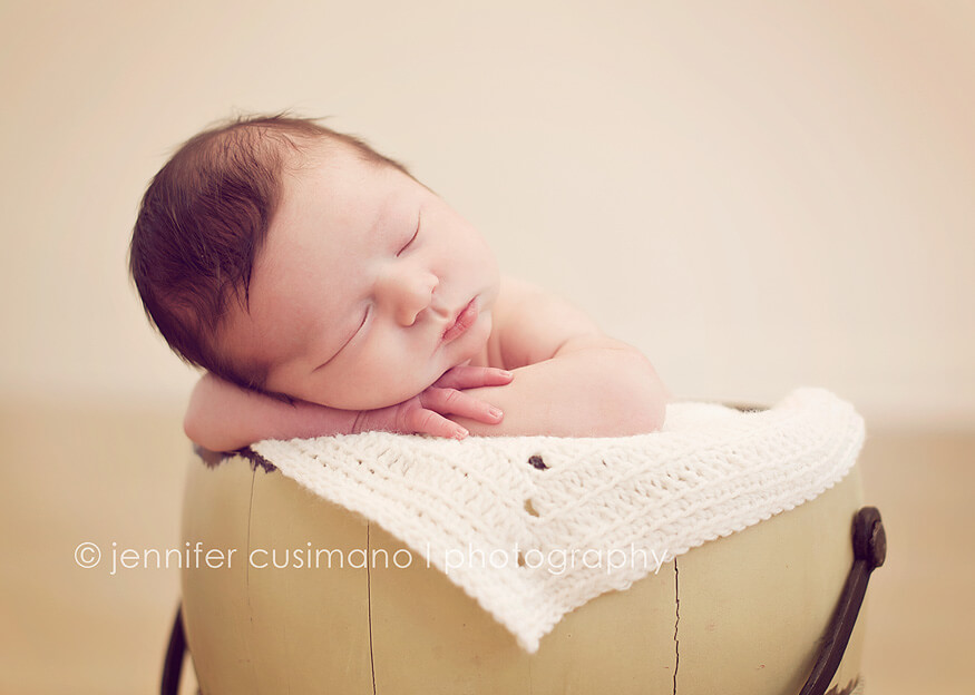 houston newborn photographer baby in yellow bucket